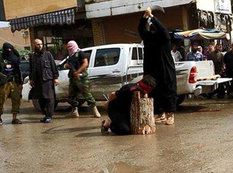İŞİD bu dəfə yeniyetmə başı kəsdi - FOTO 18+